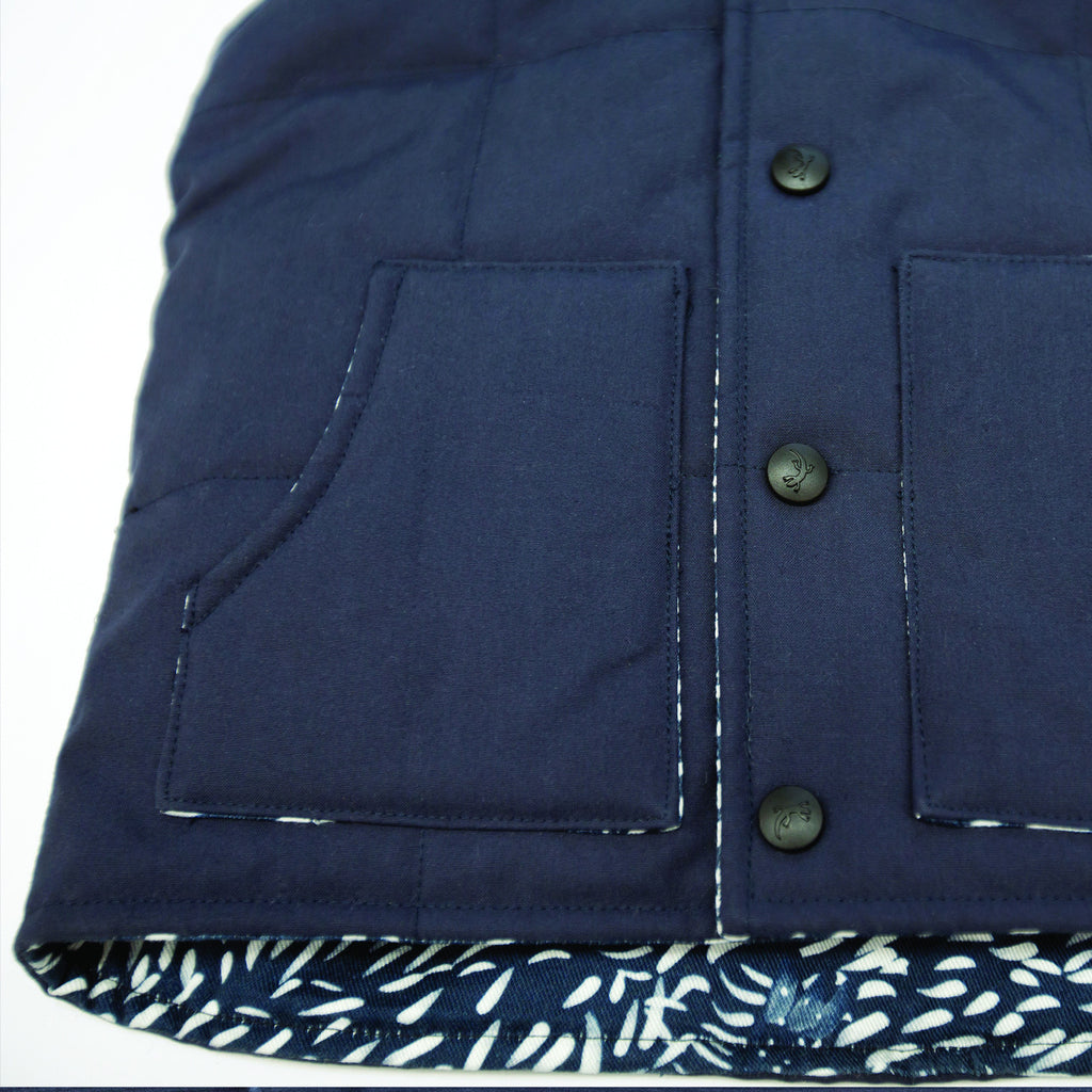 Navy outdoor vest with lizard print lining